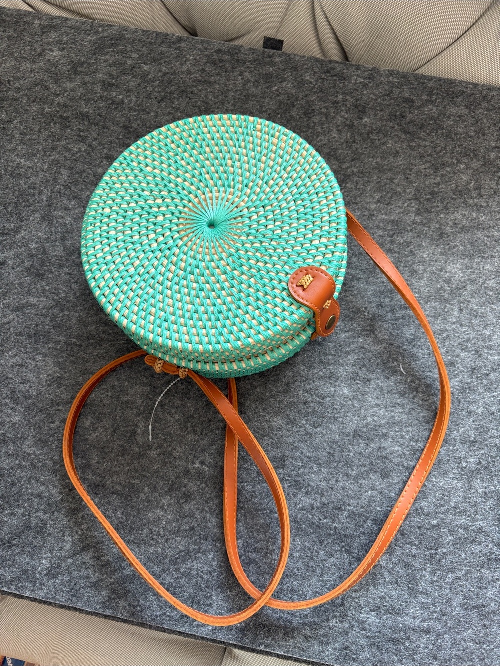 Round Woven Crossbody Bag in Turquoise with Brown Strap